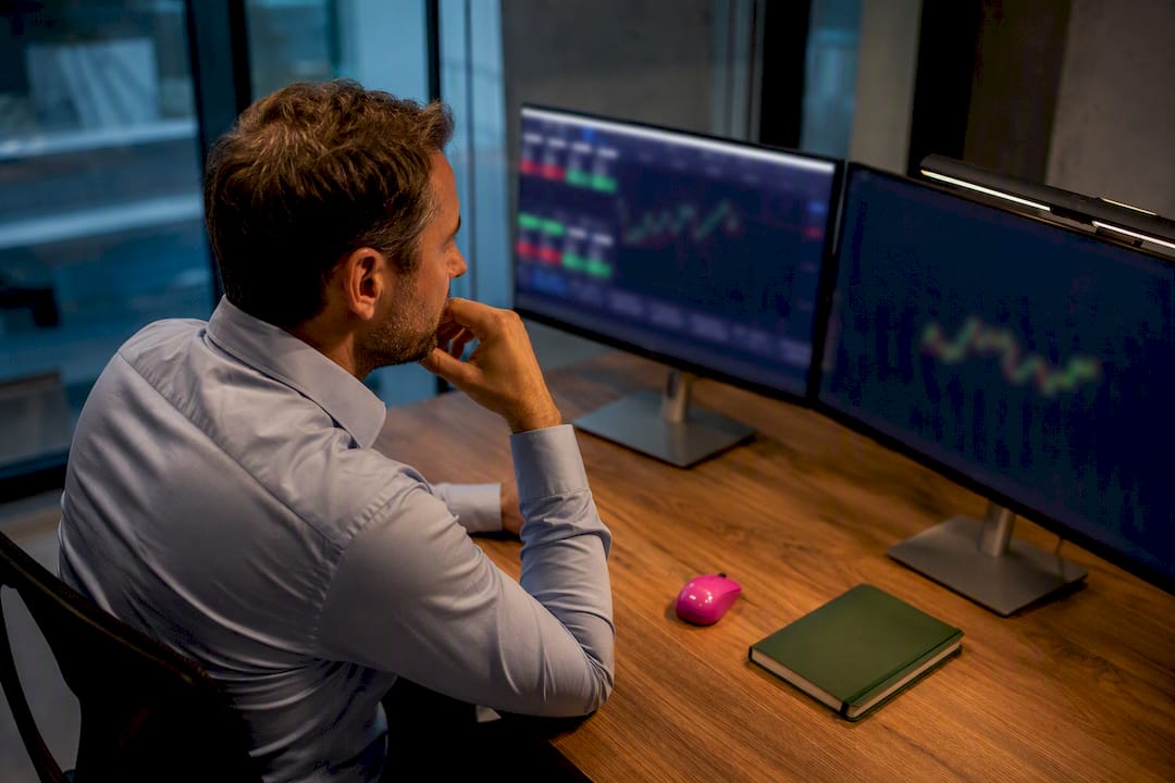 Trading terminals showing position-copying decision