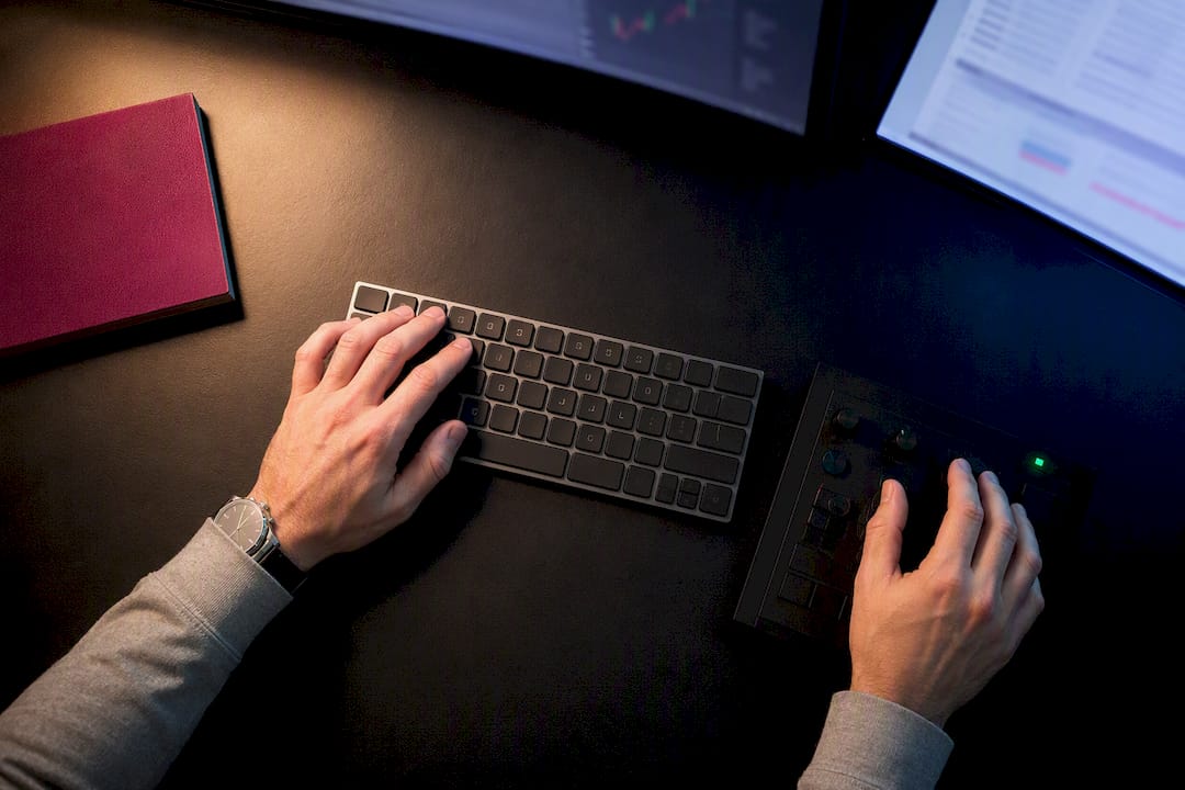 Trader checking symbols across two terminals